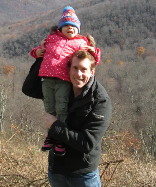 Mike with his daughter in the mountains